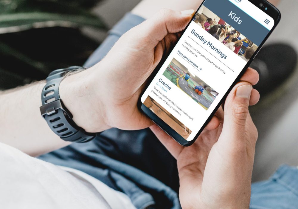 android phone in hand mockup - CBC